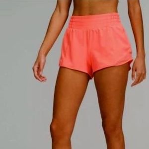 neon coral pink Lulu shorts